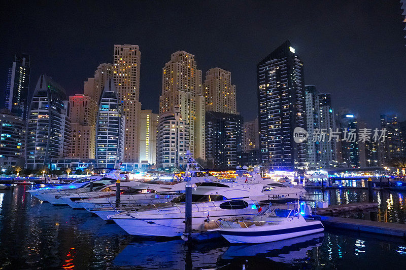 Dubai Marina in Dubai, UAE. View of the skyscrapers and the canal, view at night
